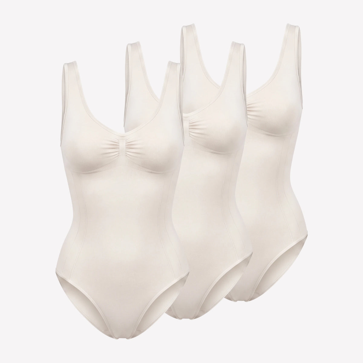 {"alt": "Shaping Body mit breiten Trägern - Oberteile - Cremeweiß", "quantity":"3"}