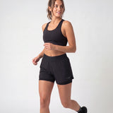 Pantaloncini sportivi 2 in 1 da donna | Nero