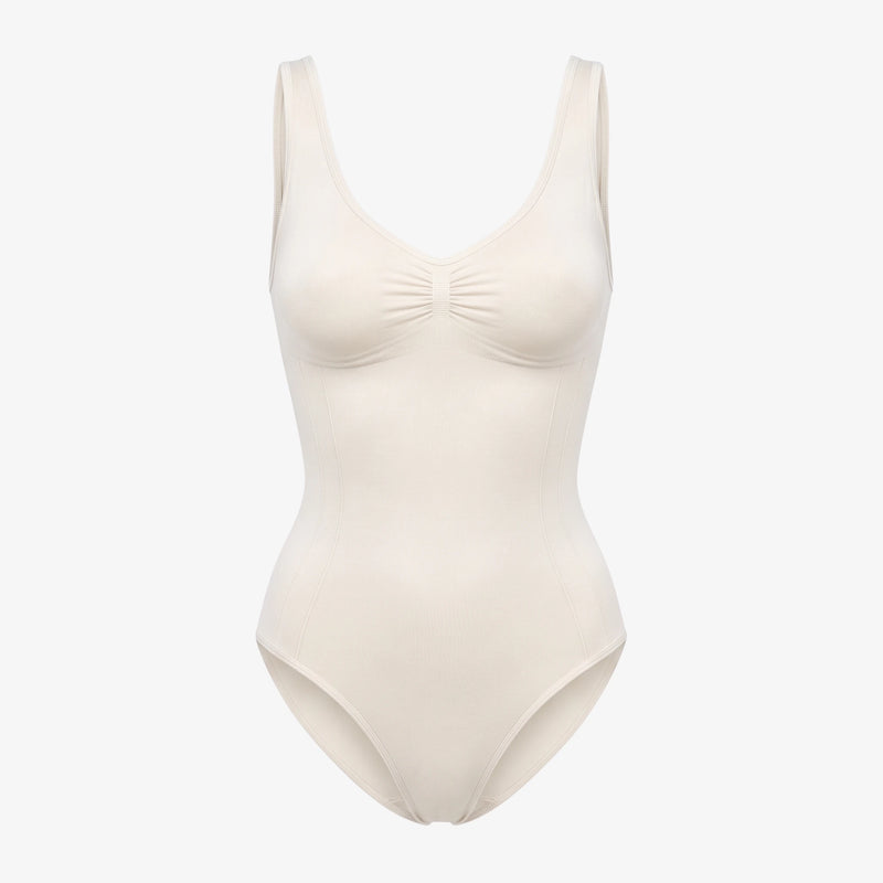 {"alt": "Shaping Body mit breiten Trägern - Oberteile - Cremeweiß", "quantity":"1"}